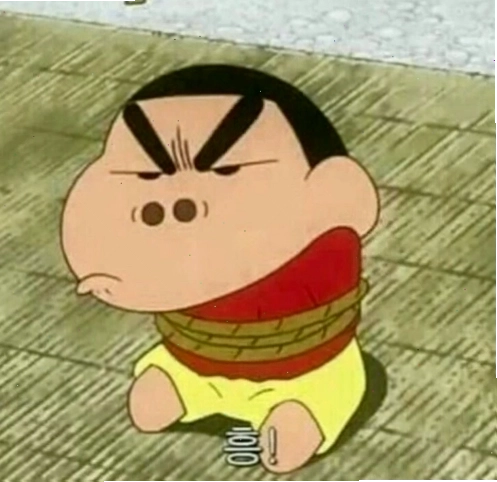 Meme Shin cậu bé bút chì đang nằm dài trên sàn, vẻ mặt chán nản, giống như đang đối mặt với một ngày dài mệt mỏi.